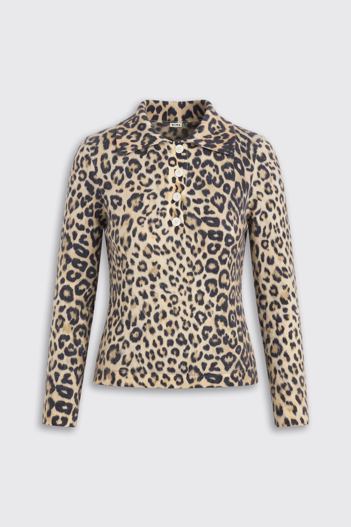 Kristy - Savannah Leopard Brown long-sleeved collared shirt in a brown and black leopard print with a four-button placket.