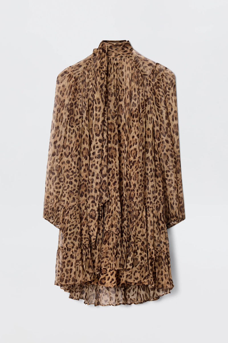 The Anaya - Mila Leopard Brown dress features a striking high neckline, long sleeves, and loose fit in lightweight, semi-sheer fabric with a bold brown and black leopard print.