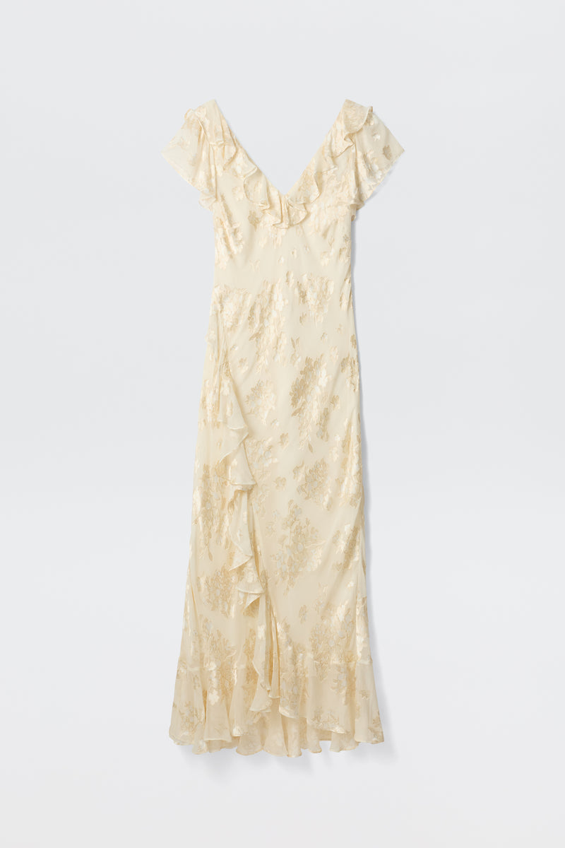 The Meadow - Bouquet Devoré Cream is a bohemian, cream midi dress with short sleeves, a V-neck, delicate floral patterns, and ruffle details on the skirt and hem, shown against a plain white background.