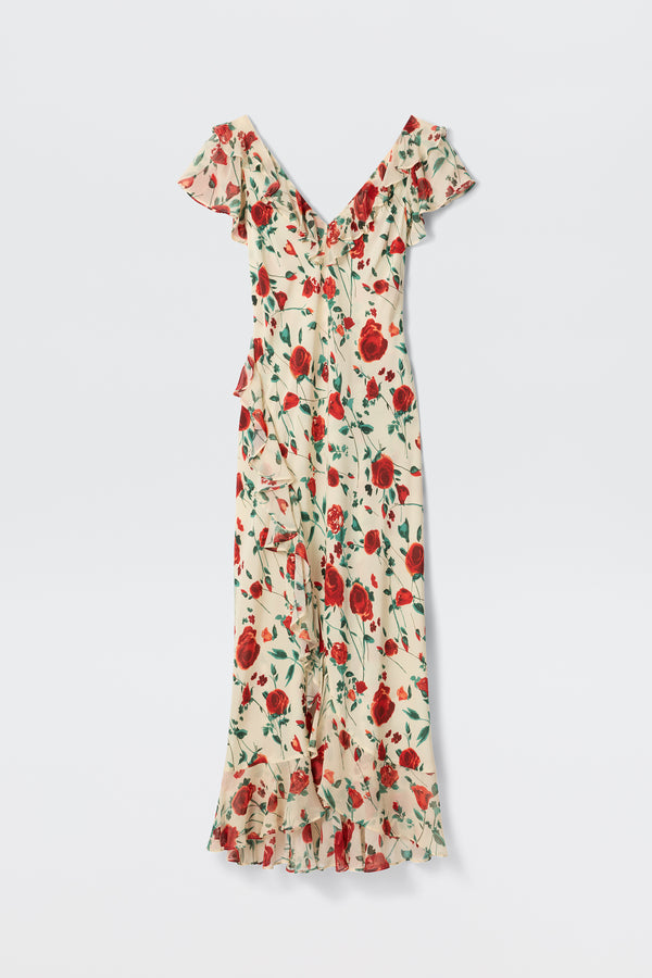 The Meadow - Claudia Rose Cream is a long cream dress with red rose floral print, ruffled short sleeves, deep V-neckline, fitted waist, and ruffled hem for a flowy, elegant look.