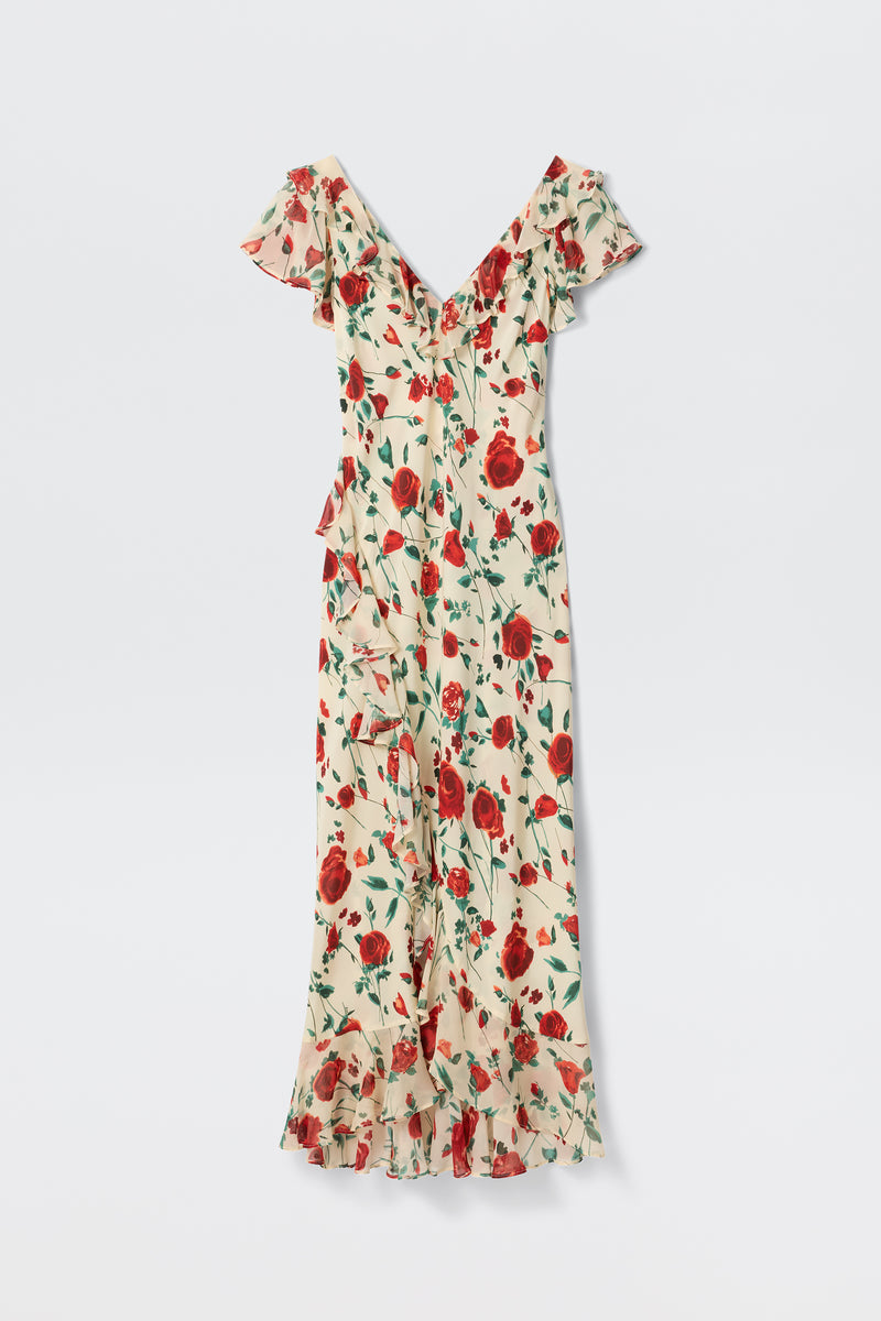 The Meadow - Claudia Rose Cream is a long cream dress with red rose floral print, ruffled short sleeves, deep V-neckline, fitted waist, and ruffled hem for a flowy, elegant look.