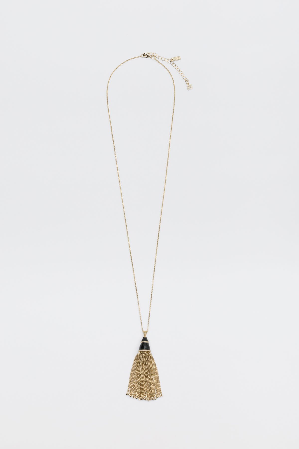 Lizbeth - Gold necklace featuring a black conical charm with a hanging gold fringe tassel.