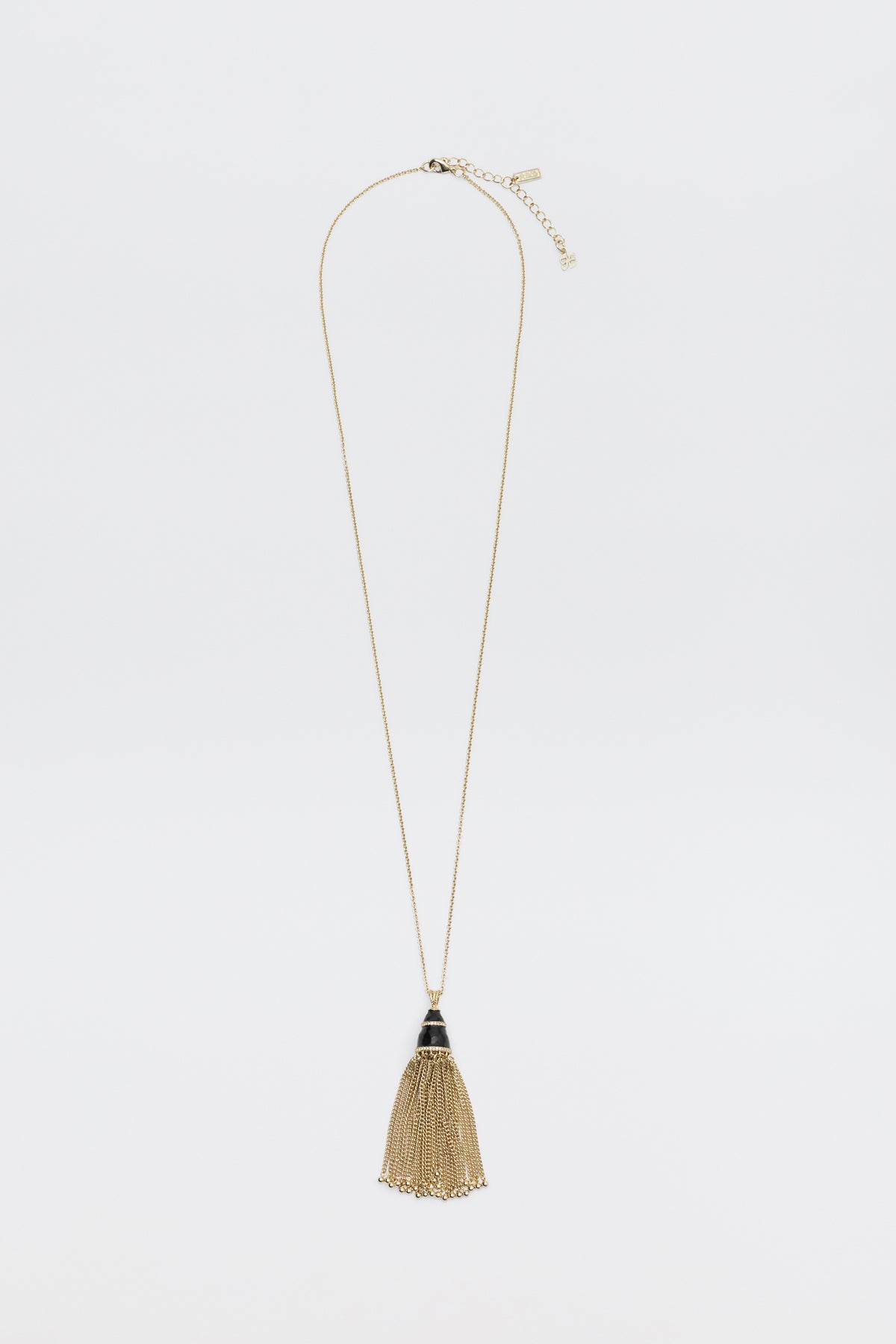 Lizbeth - Gold necklace featuring a black conical charm with a hanging gold fringe tassel.