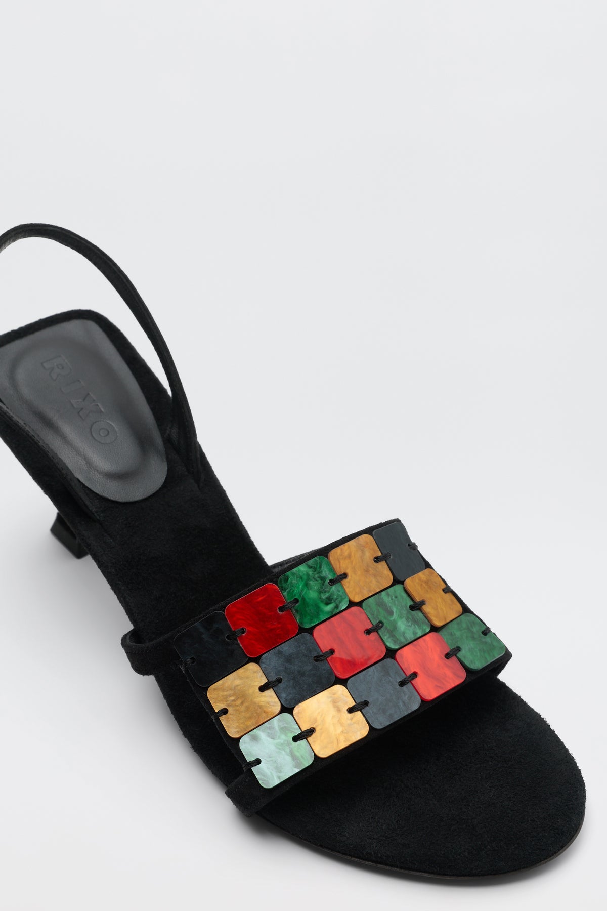 Indie - Multi black suede slingback sandal with a square-toe front strap decorated with colorful, grid-patterned resin tiles.