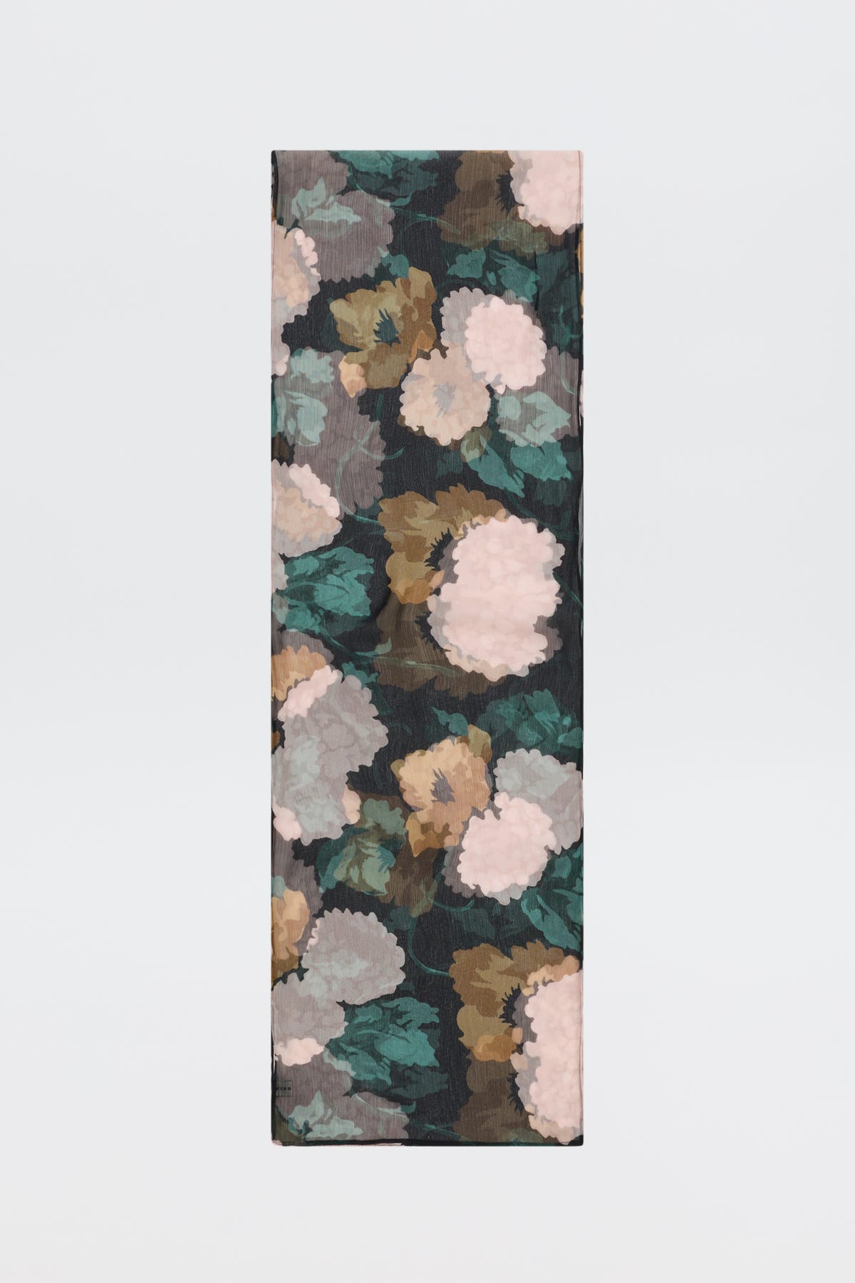 A rectangular piece of “Julien - Hydrangea Floral Charcoal” fabric featuring a floral pattern in muted pink, green, brown, and beige tones set against a dark charcoal background, displayed on a plain white surface.