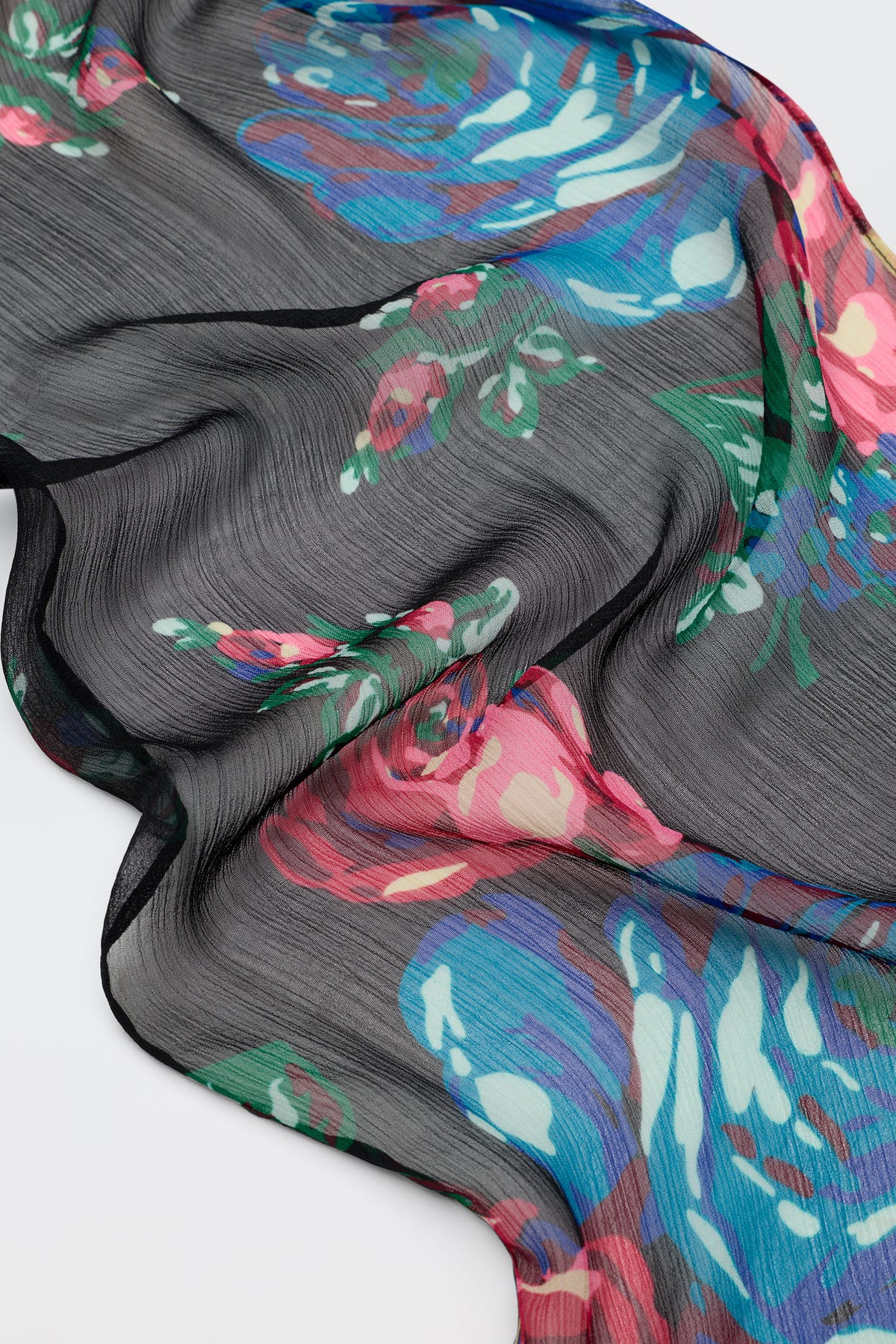 Julien - Vintage Bouquet Black sheer fabric with a colorful floral print featuring red and blue roses.