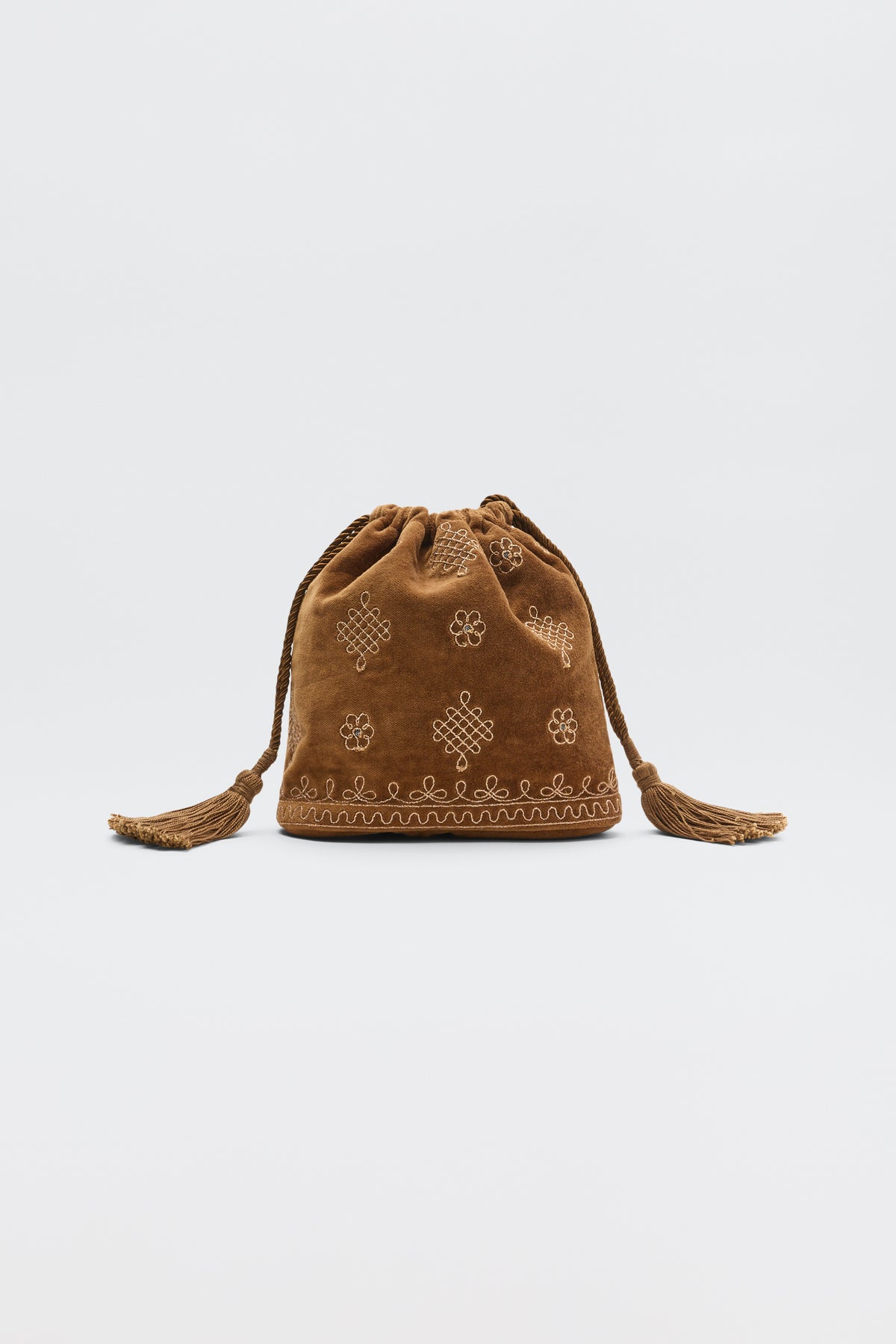 Orla - Waffle Soutache Embroidery Brown drawstring pouch with embroidered floral and knot patterns and tassel-tipped cords.