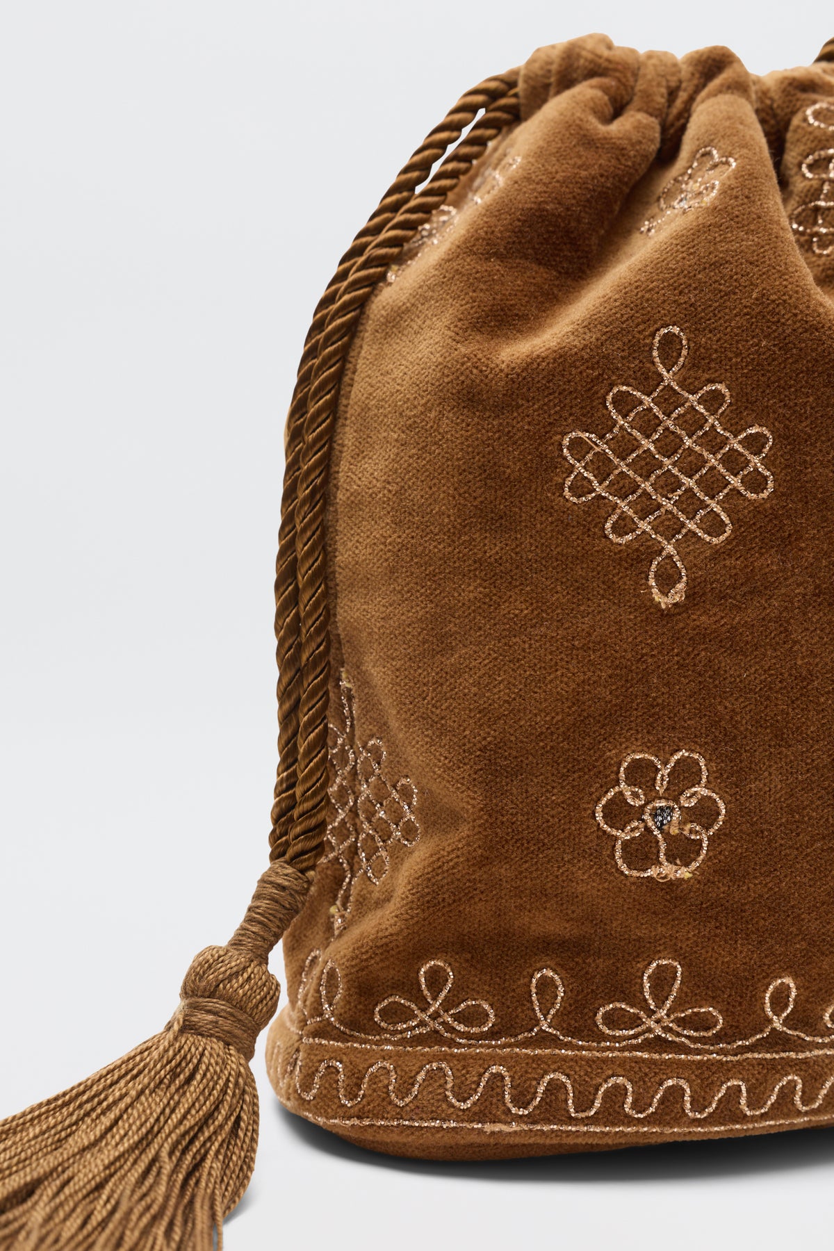 Orla - Waffle Soutache Embroidery Brown drawstring bag in brown velvet with gold-tone decorative embroidery and a matching tassel.