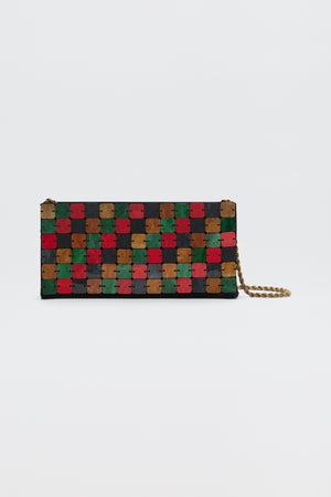 Gracelyn - Multi rectangular clutch bag covered in a grid of multicolored square tiles with a gold chain strap.
