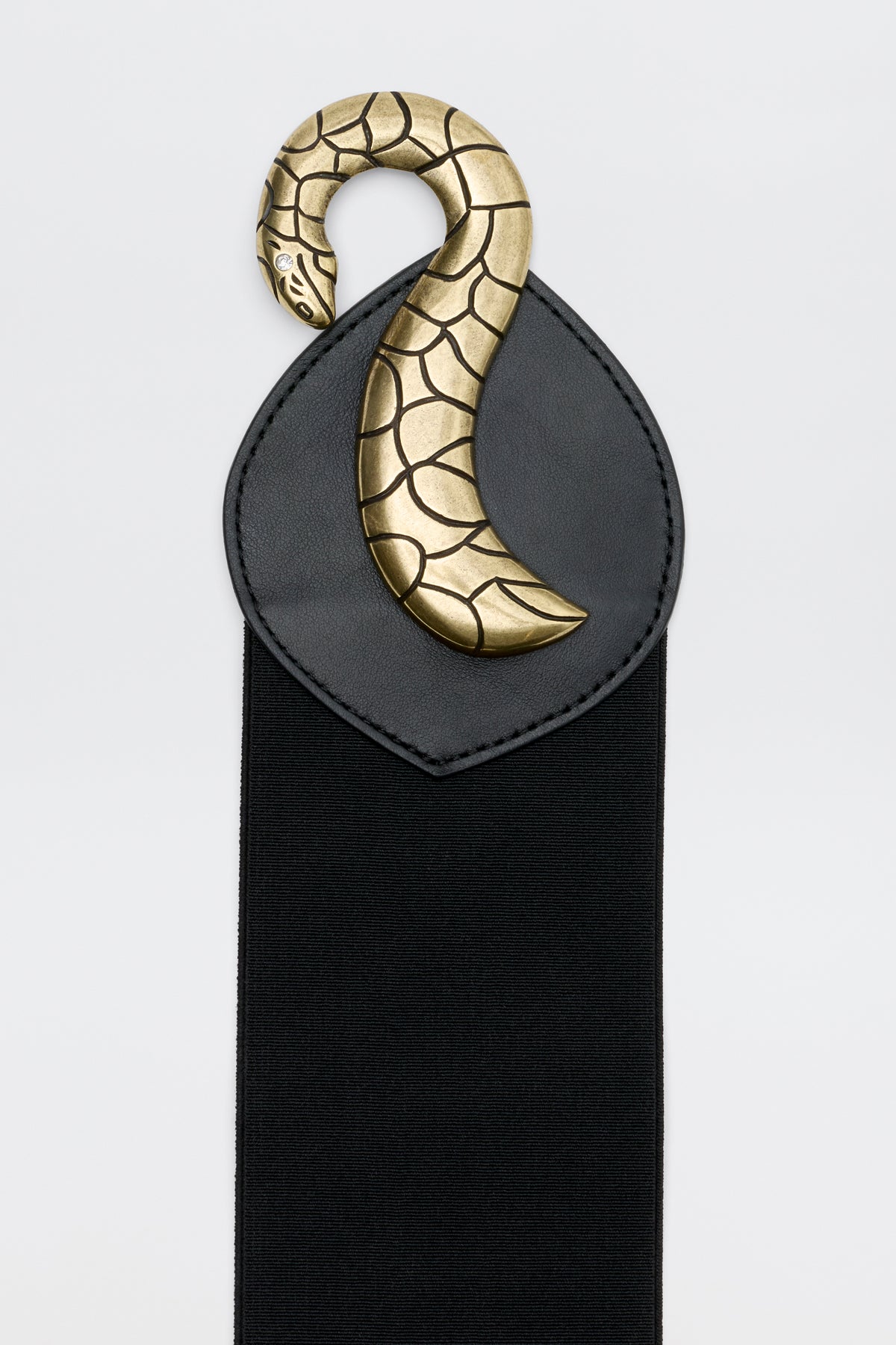 Milena - Black elastic belt featuring a gold-toned metal snake ornament on a pointed leather-like tab.