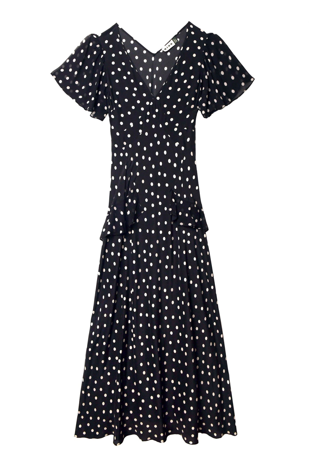 The Evie - Bohemia Spot Deep Navy is a black, short-sleeved, V-neck dress with white polka dots, a fitted waist, ruffled sleeves, and a flared skirt.