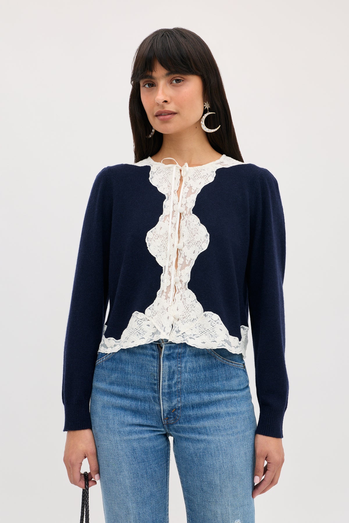 Tassia - Navy long-sleeved cardigan featuring a white lace front panel and a tie closure.