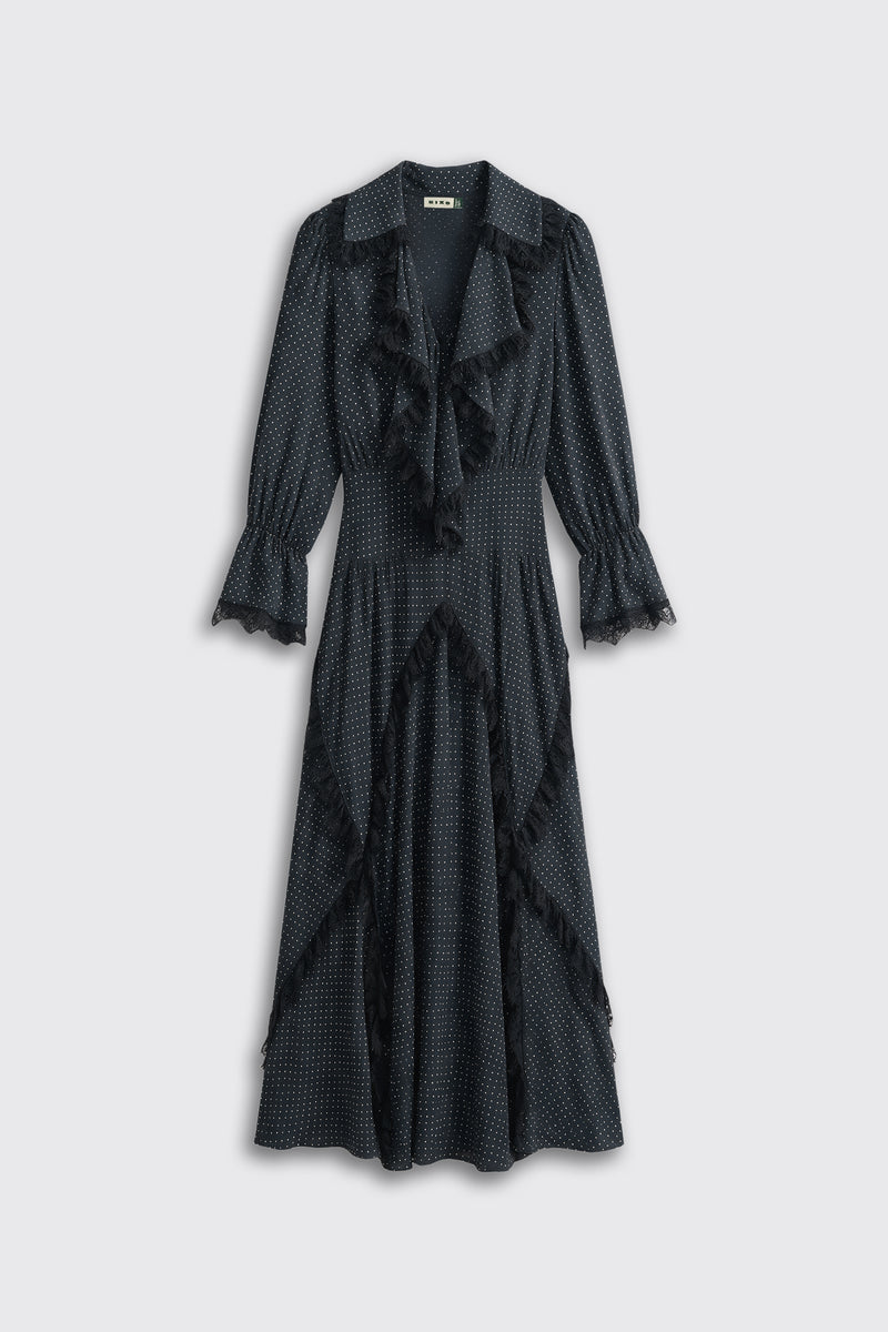 Aerin - Micro Polka Dot Black midi dress with white polka dots, featuring a ruffled V-neckline, long sleeves with ruffled cuffs, and vertical ruffle trim along the skirt.