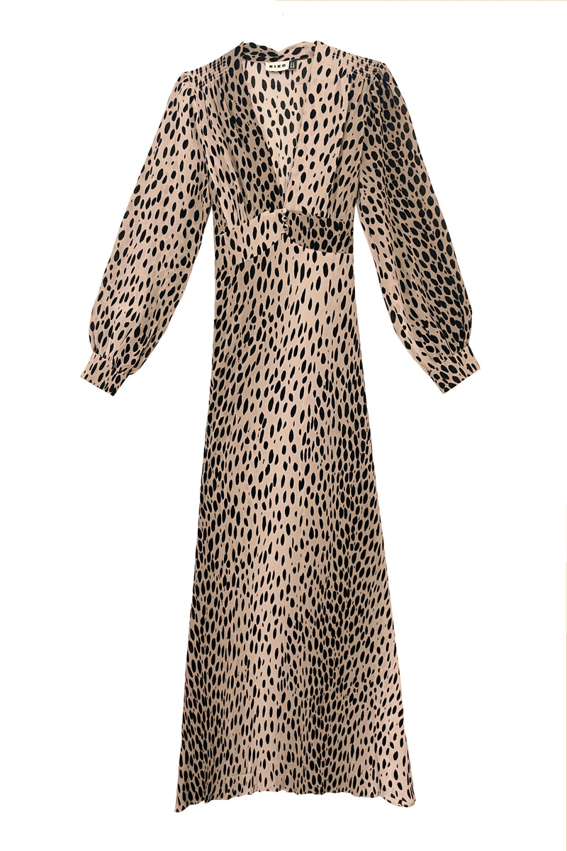 Elegant and perfect for special occasions, the Emory - Antelope Spot Black is a long-sleeved beige midi dress with a deep V-neckline, black leopard print on silk crepe de chine, a slightly fitted waist, and flowing skirt and sleeves.