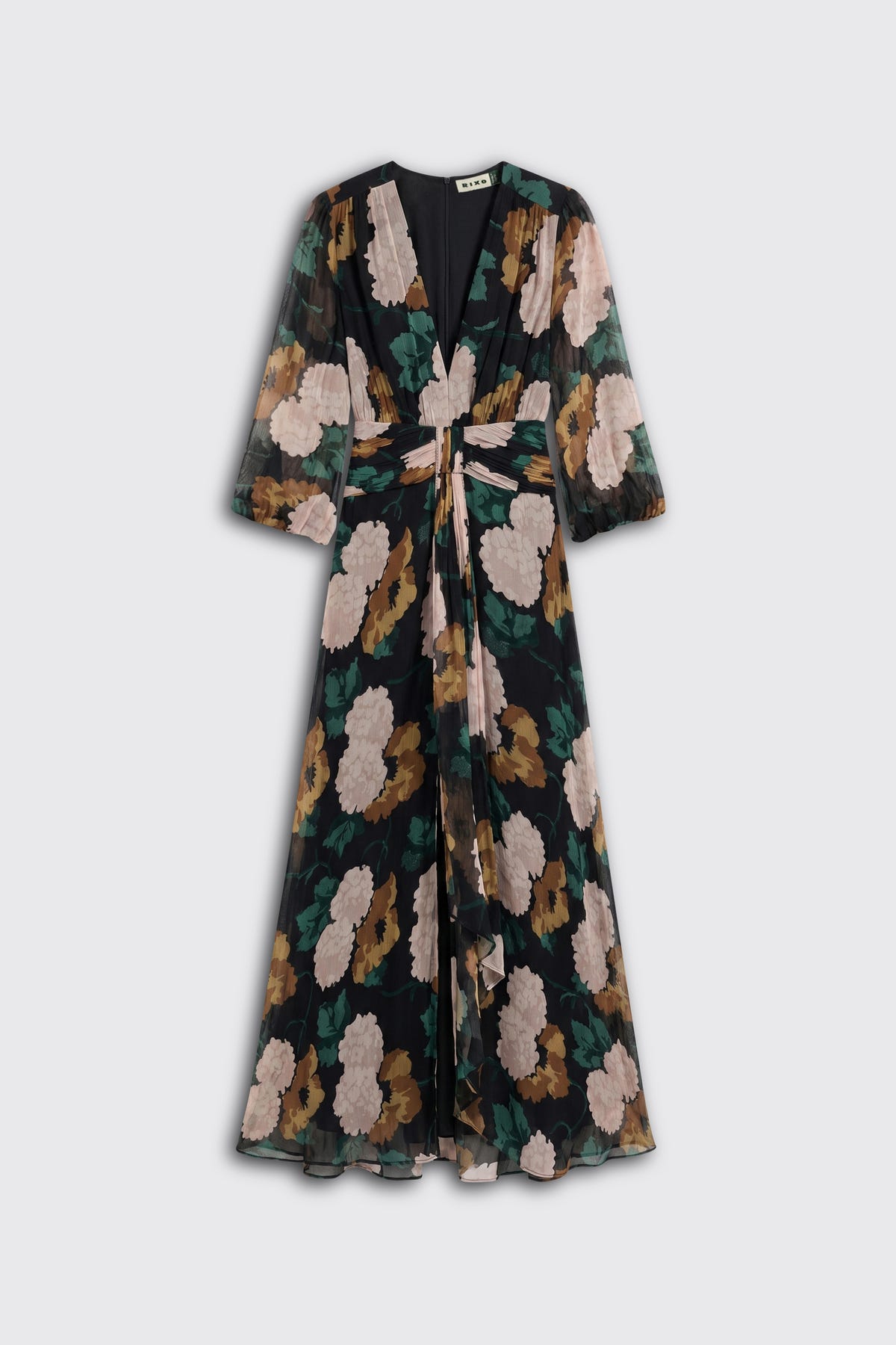The “Meera - Hydrangea Floral Charcoal” is a long, flowy dress featuring a deep V-neckline, three-quarter sleeves, and a sash that ties at the waist. It showcases a hydrangea floral pattern in shades of green, brown, tan, and white set against a charcoal black background.